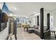 Open-concept living room with a small kitchen and dining area adjacent at 2418 Bolling Brook Sw Dr, Atlanta, GA 30311