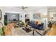Inviting living area with hardwood floors, stylish seating, and open layout to the dining space at 2418 Bolling Brook Sw Dr, Atlanta, GA 30311