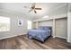 Inviting bedroom with vaulted ceilings, hardwood floors, and a comfortable bed at 3162 Alston Dr, Decatur, GA 30032