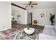 Open-concept living room with hardwood floors and modern decor and a cozy seating area at 3162 Alston Dr, Decatur, GA 30032