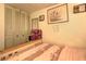 Bedroom with large closet, neutral walls adorned with framed artwork, and carpeted floor at 3576 Shrewsbury Ct, Snellville, GA 30039