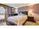 Cozy bedroom with carpet, natural light, and ample storage at 3576 Shrewsbury Ct, Snellville, GA 30039