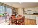 Bright dining room with wood floors, with an adjacent deck at 3576 Shrewsbury Ct, Snellville, GA 30039