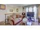 Relaxing living room with a comfortable sofa and curtains at 3576 Shrewsbury Ct, Snellville, GA 30039