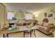 The living room features neutral tones, large windows, and cozy seating, perfect for relaxation at 3576 Shrewsbury Ct, Snellville, GA 30039