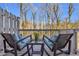 Inviting balcony with modern wicker seating and views of nature at 420 Heritage Park Nw Trce # 22, Kennesaw, GA 30144