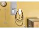 Garage with electric vehicle charger, electric panel, and outlet at 420 Heritage Park Nw Trce # 22, Kennesaw, GA 30144