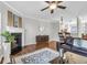Inviting living room with fireplace, hardwood floors, and ample space at 420 Heritage Park Nw Trce # 22, Kennesaw, GA 30144