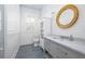 Stylish bathroom with patterned floor tiles, marble countertop, and walk-in shower at 1308 Fairview Ne Rd, Atlanta, GA 30306