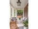 Cozy front porch with comfortable seating and stylish decor for relaxing and entertaining at 1308 Fairview Ne Rd, Atlanta, GA 30306