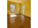 Sun-filled bedroom featuring natural light and classic wood flooring at 917 Greymont Nw Cir, Marietta, GA 30064