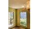 Living room with hardwood floors, bright windows, and chandelier at 917 Greymont Nw Cir, Marietta, GA 30064