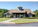 Stunning clubhouse with stone accents, lush landscaping, and inviting entrance at 1345 Bridgemill Ave, Canton, GA 30114