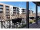 Urban balcony showcasing city views and modern architecture, complete with planter boxes and railing at 345 Glen Iris Ne Dr # 5, Atlanta, GA 30312