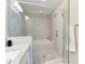 Bright bathroom featuring vanity with granite countertops and glass shower enclosure at 345 Glen Iris Ne Dr # 5, Atlanta, GA 30312