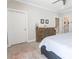 This bedroom features a neutral color palette, dresser, carpet floors and ensuite bathroom at 345 Glen Iris Ne Dr # 5, Atlanta, GA 30312