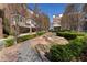 Exterior shot of a townhome community area featuring sidewalks and mature trees at 345 Glen Iris Ne Dr # 5, Atlanta, GA 30312