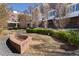 Community fire pit with seating area and landscaped plantings in the townhome community at 345 Glen Iris Ne Dr # 5, Atlanta, GA 30312