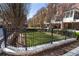 Townhome community green space features wrought iron fence and manicured lawn at 345 Glen Iris Ne Dr # 5, Atlanta, GA 30312