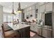 Bright kitchen featuring stainless steel appliances, a large island, and ample cabinet space for storage at 345 Glen Iris Ne Dr # 5, Atlanta, GA 30312