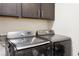Modern laundry room featuring gray Samsung front load washer and dryer at 345 Glen Iris Ne Dr # 5, Atlanta, GA 30312