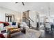 Bright living room featuring dark hardwood floors, neutral walls, and an open floor plan at 345 Glen Iris Ne Dr # 5, Atlanta, GA 30312