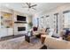 Inviting living room featuring large windows, neutral tones, and a comfortable seating area with a fireplace at 345 Glen Iris Ne Dr # 5, Atlanta, GA 30312