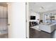 Inviting living room with modern decor, a plush sofa, and access to a balcony, adjacent to a bathroom at 345 Glen Iris Ne Dr # 5, Atlanta, GA 30312