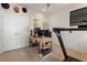 Bright home office featuring white shiplap walls, a desk, and a treadmill at 345 Glen Iris Ne Dr # 5, Atlanta, GA 30312