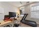 Functional office space with a treadmill, offering a blend of work and fitness opportunities at 345 Glen Iris Ne Dr # 5, Atlanta, GA 30312