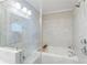 Bright shower featuring a tub and white subway tile surround at 345 Glen Iris Ne Dr # 5, Atlanta, GA 30312
