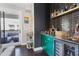 Wet bar area featuring a green bar, wine fridge, dark backsplash and decor at 345 Glen Iris Ne Dr # 5, Atlanta, GA 30312