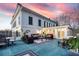 Spacious back patio featuring an outdoor seating area and access to the home at 3816 Turnberry Ct, Duluth, GA 30096