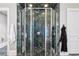 Close up of marble shower in this bathroom featuring glass doors and great lighting at 3816 Turnberry Ct, Duluth, GA 30096