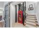 Unique entryway with a staircase, British telephone box, and a cozy sitting area showcases character at 3816 Turnberry Ct, Duluth, GA 30096