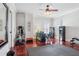 This workout room features a ceiling fan, exercise equipment and hardwood floors, fitness made easy at 3816 Turnberry Ct, Duluth, GA 30096