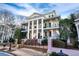 Stately two-story home with grand columns and wrought iron balconies at 3816 Turnberry Ct, Duluth, GA 30096