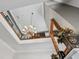 Second-story view of the elegant foyer with chandelier and staircase at 3816 Turnberry Ct, Duluth, GA 30096