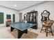 Enjoy this game room with space for ping pong and bar seating at 3816 Turnberry Ct, Duluth, GA 30096