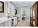 Hallway area with lots of natural light and access to the bathroom at 3816 Turnberry Ct, Duluth, GA 30096