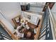 Second story landing area with an ornate railing overlooking the main floor fireplace at 3816 Turnberry Ct, Duluth, GA 30096