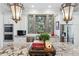 Kitchen island featuring granite countertops, custom cabinets and stainless sink at 3816 Turnberry Ct, Duluth, GA 30096