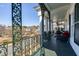 Outdoor porch with columns and ornate black rails overlooking the street at 3816 Turnberry Ct, Duluth, GA 30096
