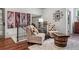 Cozy sitting area with decorative chairs, barrel table, and unique art at 3816 Turnberry Ct, Duluth, GA 30096