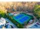 Community features well-maintained tennis courts, a playground, and beautiful landscaping at 3816 Turnberry Ct, Duluth, GA 30096