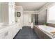 Elegant bathroom boasting a soaking tub and a glass walk-in shower at 427 Parkbrook Way, Canton, GA 30114