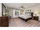 Comfortable bedroom with a stylish bed and bedside tables at 427 Parkbrook Way, Canton, GA 30114