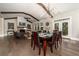 Dining room view showcasing the open-concept layout with fireplace and outside view at 427 Parkbrook Way, Canton, GA 30114