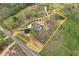 Aerial view of property showing lot lines, driveway, landscaping and surrounding acreage at 6110 Harvest Way, Cumming, GA 30028