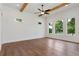 Spacious room with recessed lighting, ceiling fan, and large windows with a view of the outdoors at 6110 Harvest Way, Cumming, GA 30028